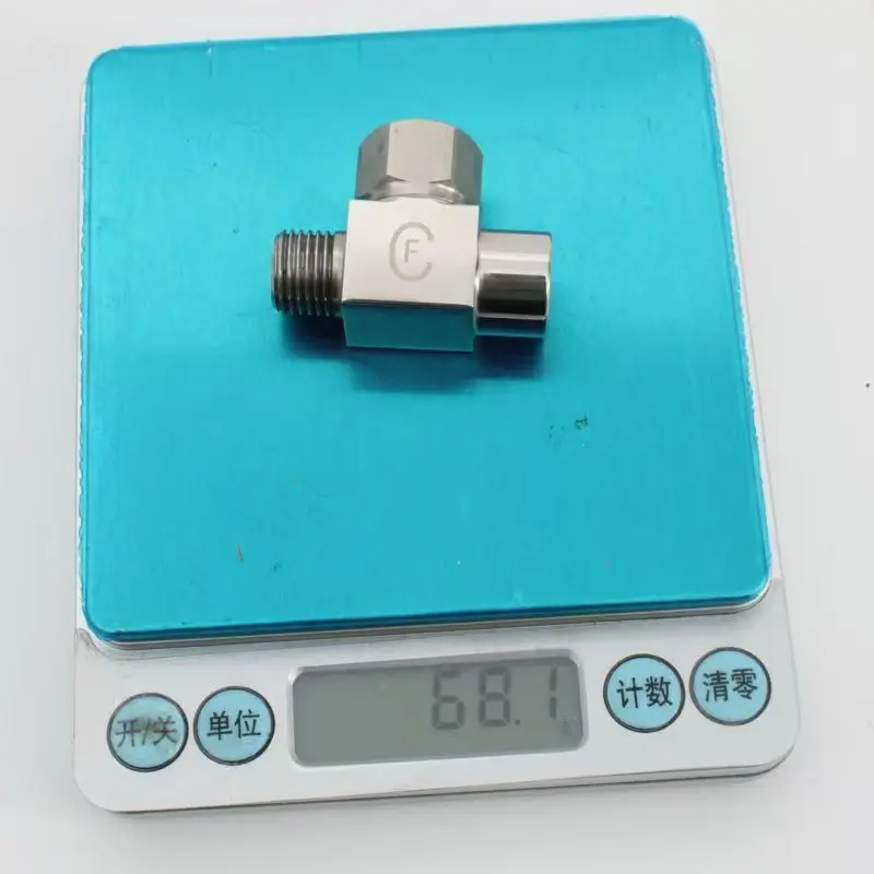 Stainless steel steam trap valve weighed on electronic scale, energy-saving accessory for garment ironing machine