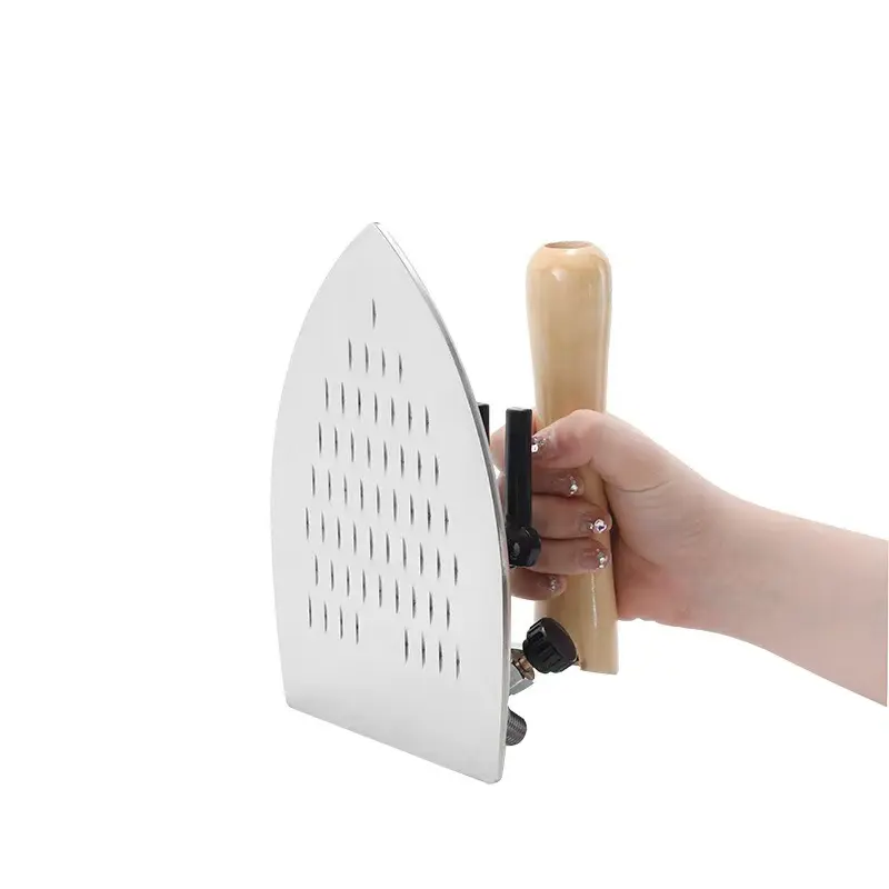 Wooden Handle Manual Steam Iron in Use at Factory